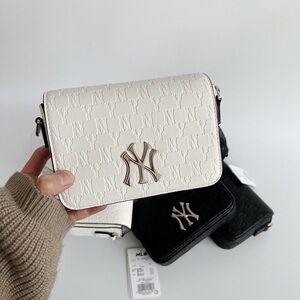White NY Logo Embossed Crossbody Bag